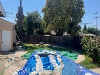 a view of backyard with seating space
