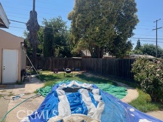 1020 West 24th Street Merced, CA 95340 - Photo 20 of 21 a view of backyard with seating space