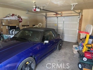 1020 West 24th Street Merced, CA 95340 - Photo 21 of 21 a car parked in a garage
