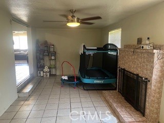 1020 West 24th Street Merced, CA 95340 - Photo 5 of 21 a living room with furniture and a fireplace