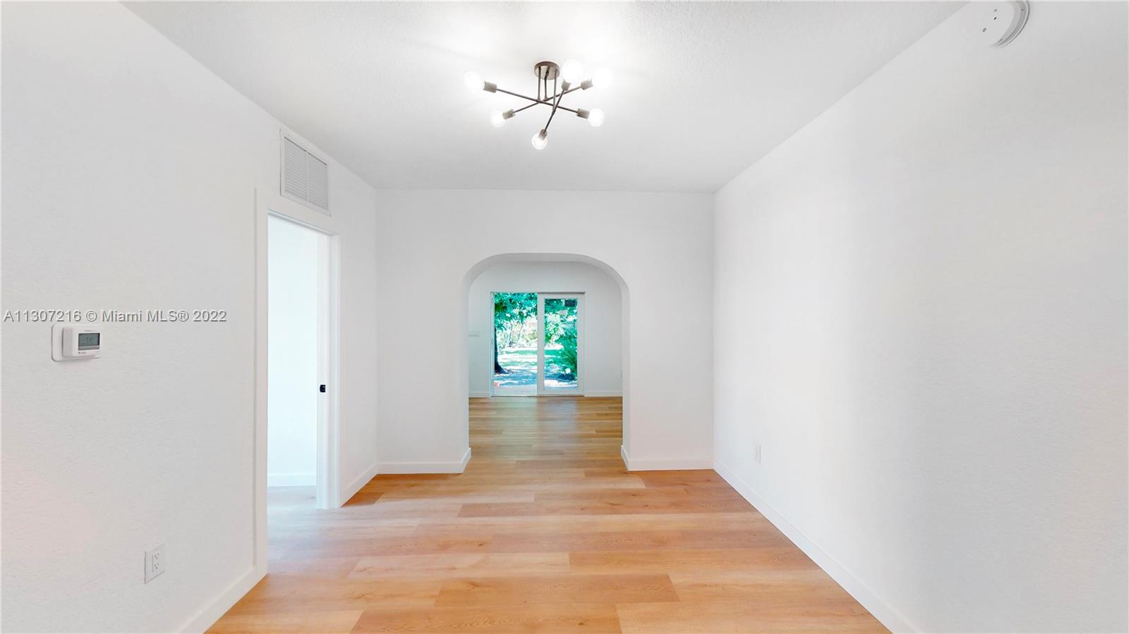 241 Southwest 31st Road Miami, FL 33129 - Photo 4 of 18 a view of an empty room with a window