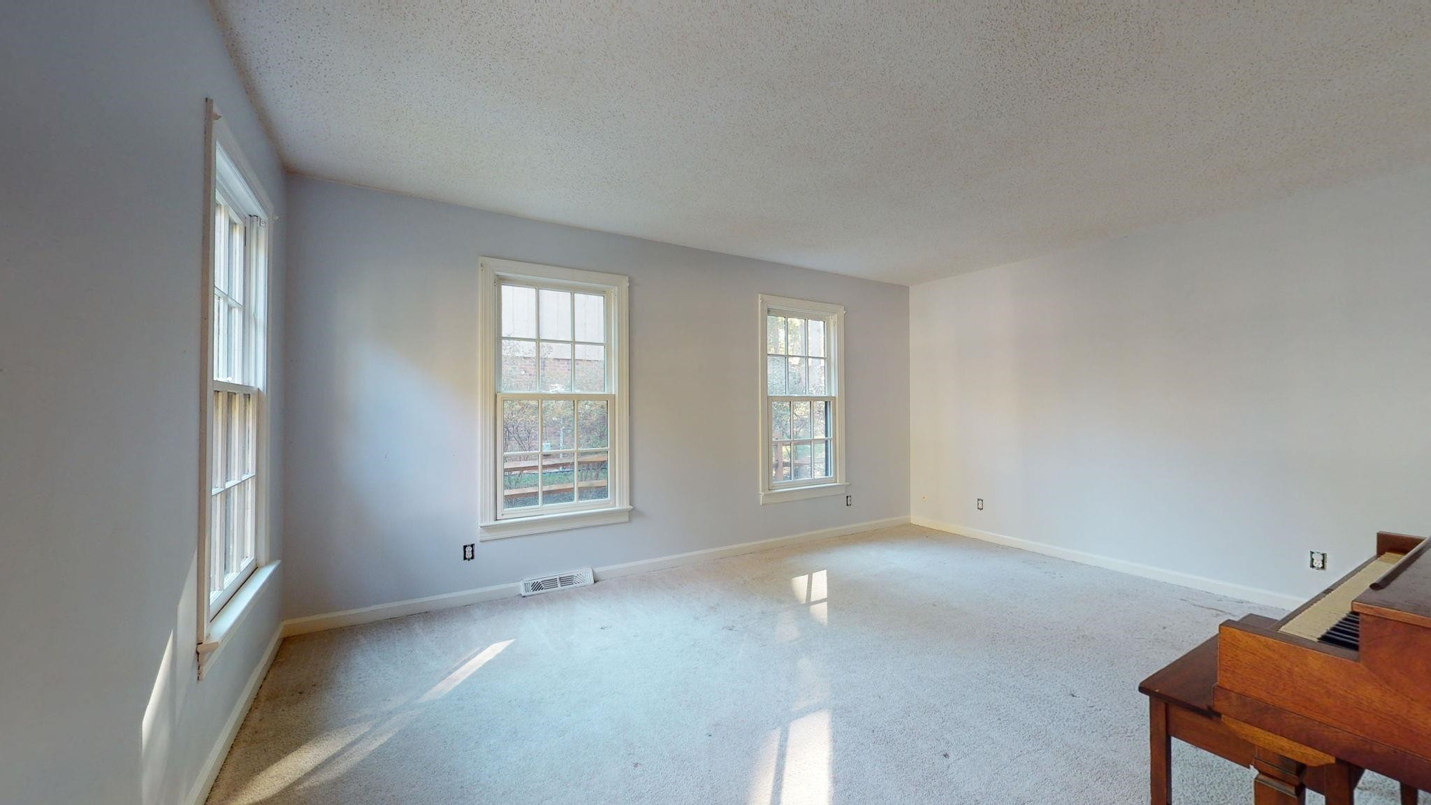 6909 Electra Drive Raleigh, NC 27607 - Photo 12 of 22 a view of an empty room with a window