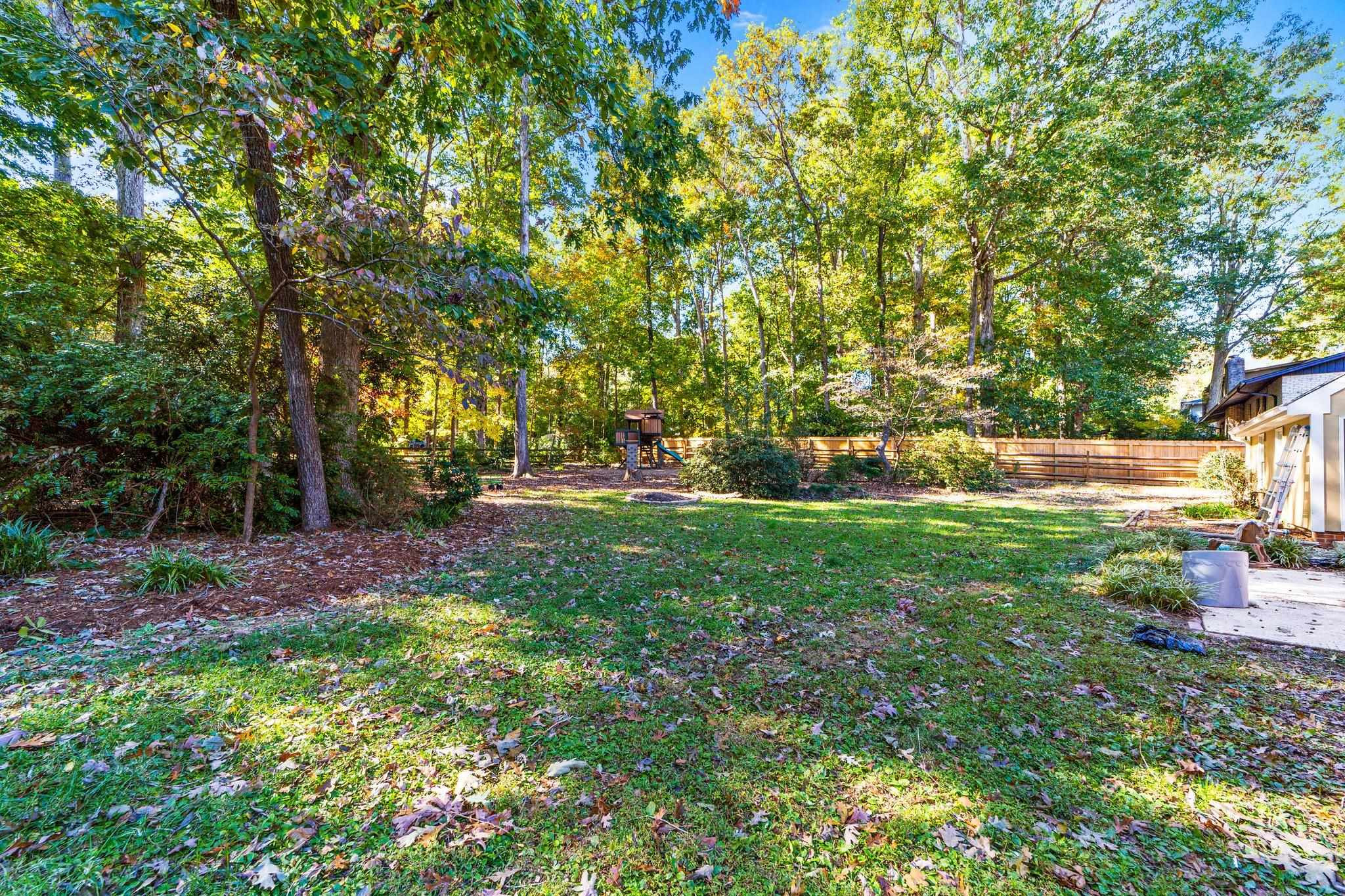6909 Electra Drive Raleigh, NC 27607 - Photo 16 of 22 a view of yard with green space