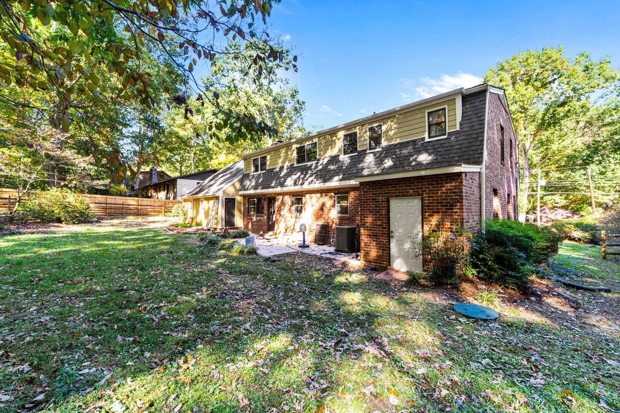 6909 Electra Drive Raleigh, NC 27607 - Photo 18 of 22 a view of a house with a yard