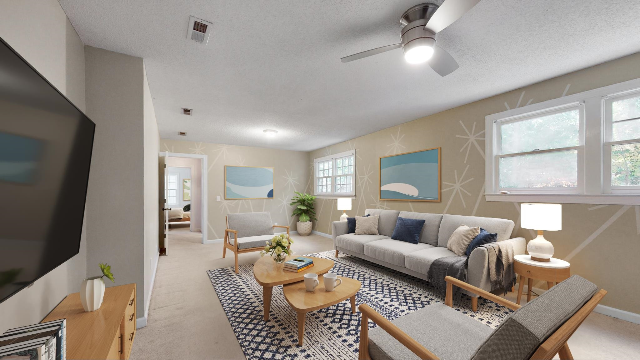 6909 Electra Drive Raleigh, NC 27607 - Photo 7 of 22 a living room with furniture and a flat screen tv