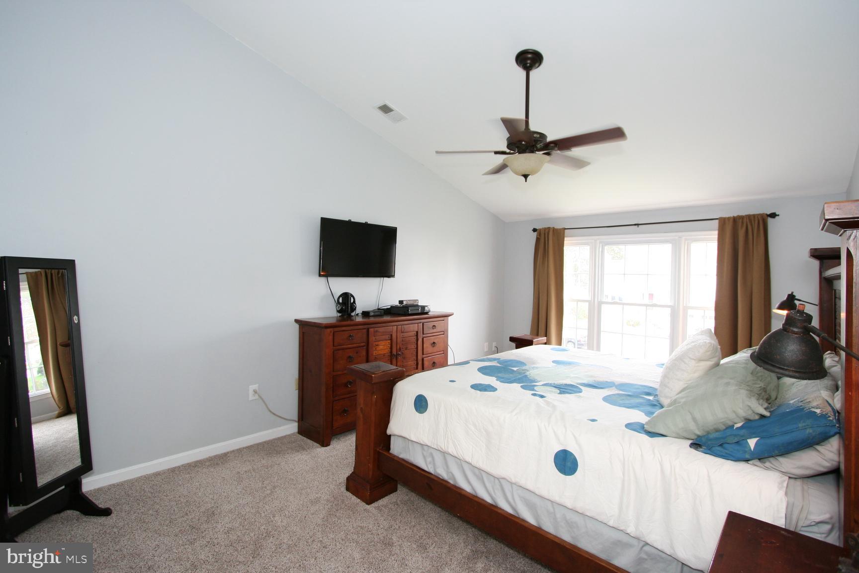 8025 Rocky Run Road Gainesville, VA 20155 - Photo 16 of 40 Master bedroom - new carpet, vaulted ceiling