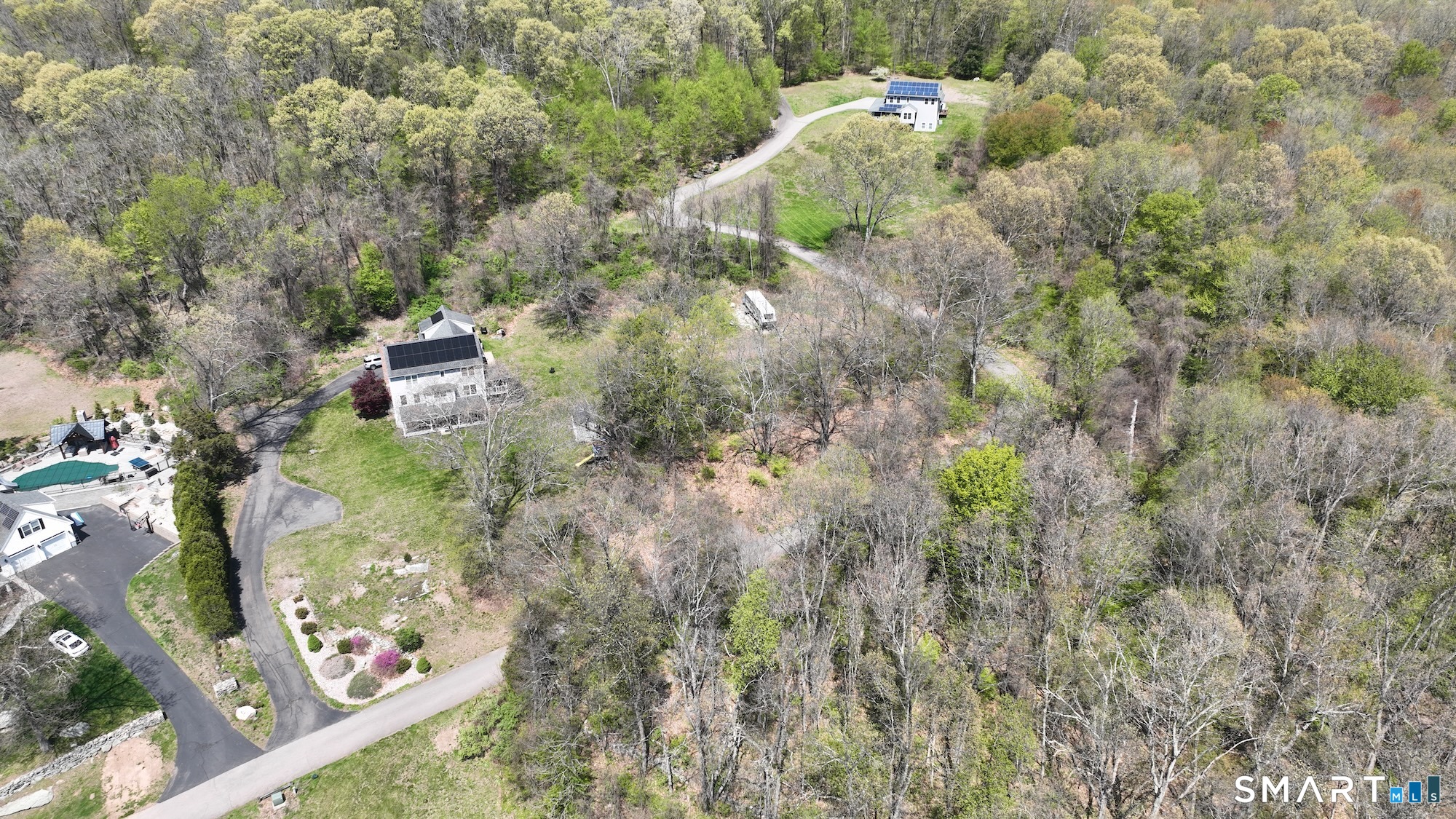 182 Cox Road Portland, CT 06480 - Photo 1 of 8 an aerial view of a house with a yard