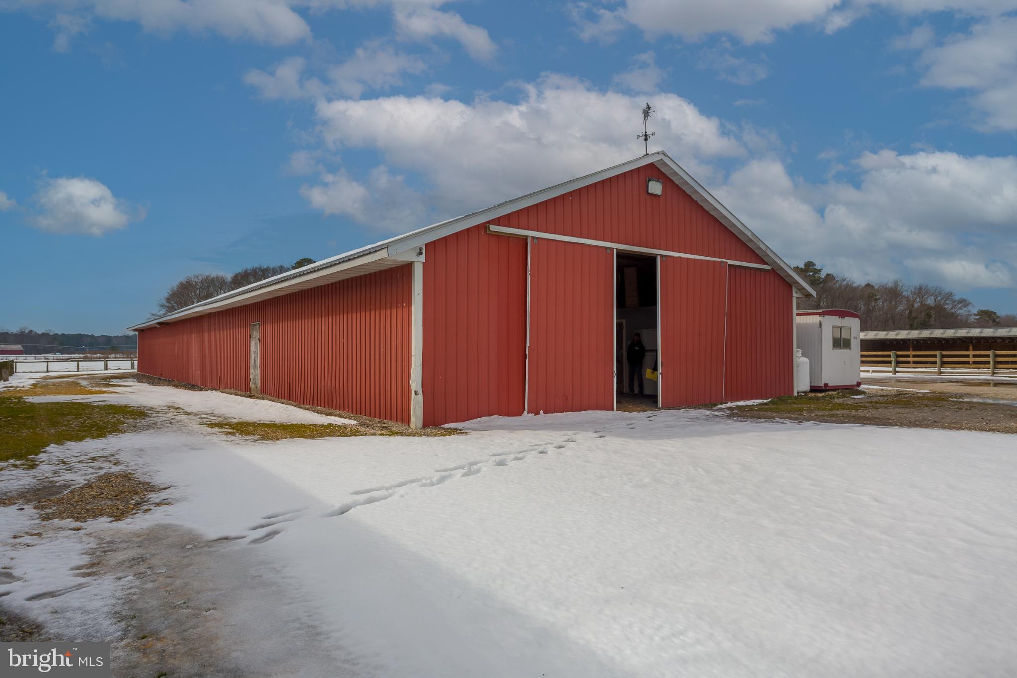 3985 White Road Federalsburg, MD 21632 - Photo 6 of 41 a backyard of a house with yard and garage