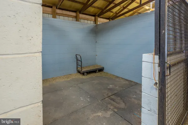 a view of a room with racks on the wall