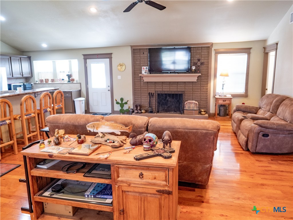 1704 Jackson Street Port Lavaca, TX 77979 - Photo 24 of 40 a living room with furniture fireplace and flat screen tv