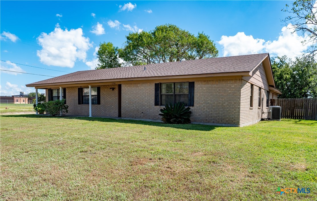 1704 Jackson Street Port Lavaca, TX 77979 - Photo 26 of 40 a view of a house with a yard