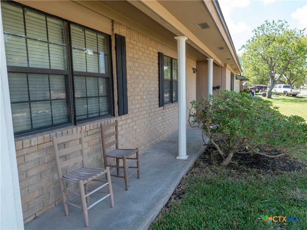 1704 Jackson Street Port Lavaca, TX 77979 - Photo 5 of 40 a view of a chair and table in backyard of the house