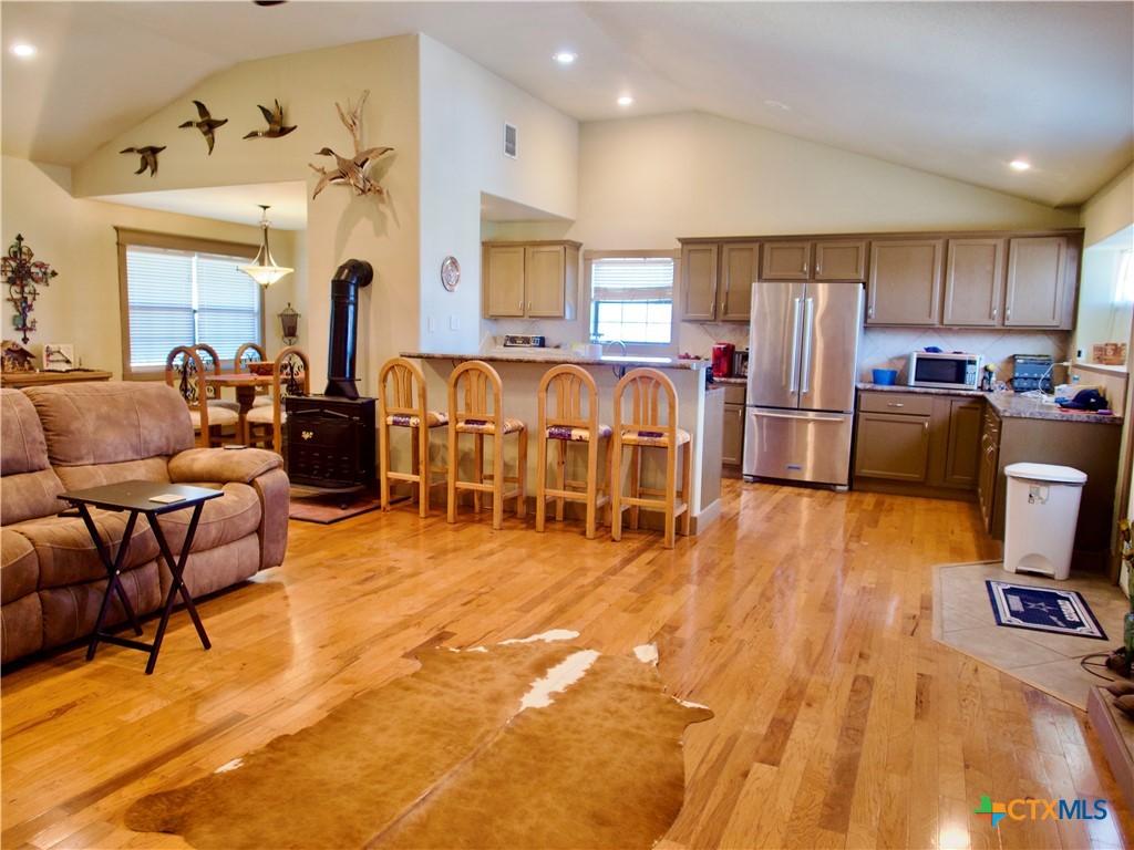 1704 Jackson Street Port Lavaca, TX 77979 - Photo 8 of 40 a living room with lots of furniture and a flat screen tv