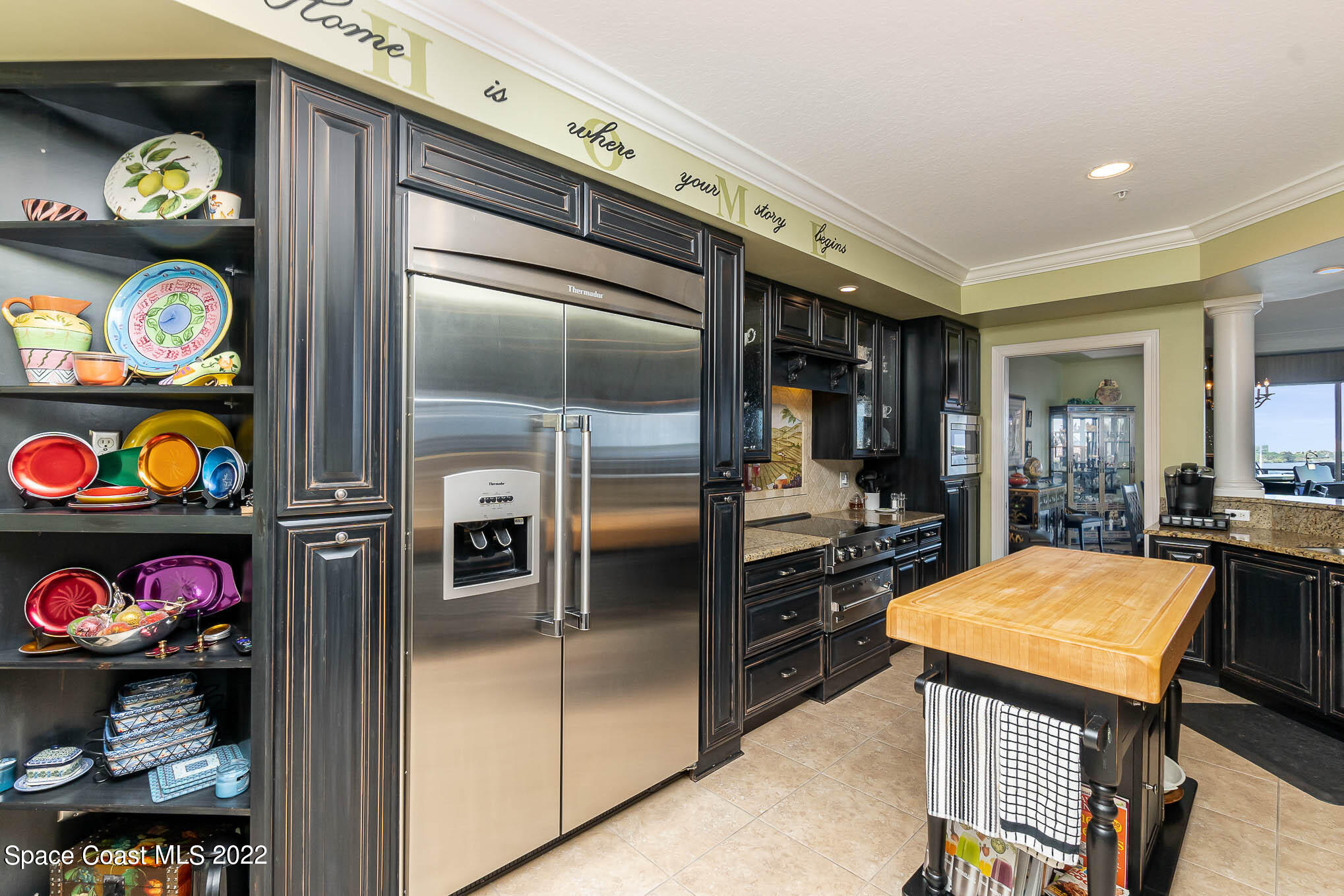 21 Riverside Drive, Unit 702 Cocoa, FL 32922 - Photo 14 of 53 a kitchen with stainless steel appliances granite countertop a refrigerator and road