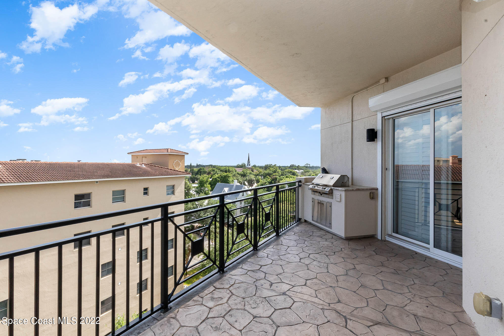 21 Riverside Drive, Unit 702 Cocoa, FL 32922 - Photo 23 of 53 a city view with lot of cabinets