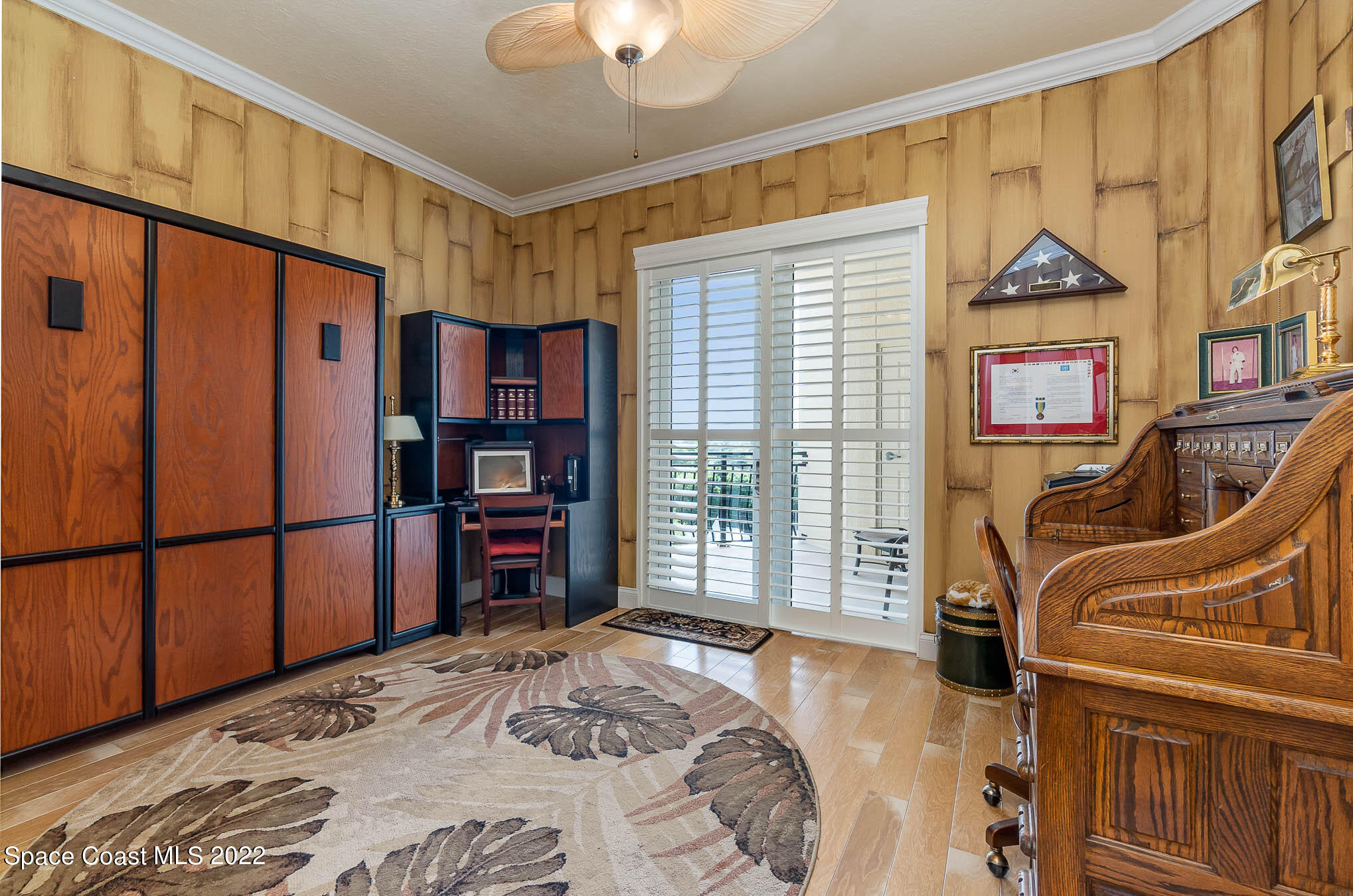 21 Riverside Drive, Unit 702 Cocoa, FL 32922 - Photo 30 of 53 a bedroom with furniture and a window