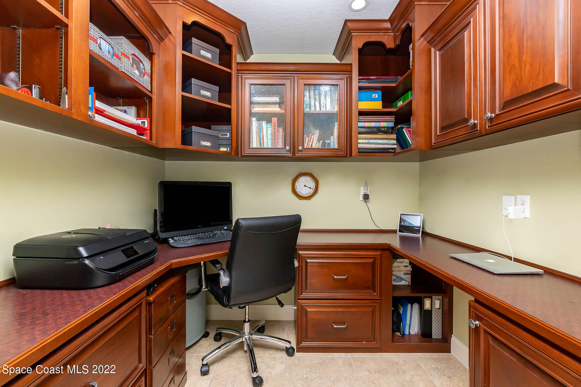 21 Riverside Drive, Unit 702 Cocoa, FL 32922 - Photo 36 of 53 a view of a workspace with cabinets