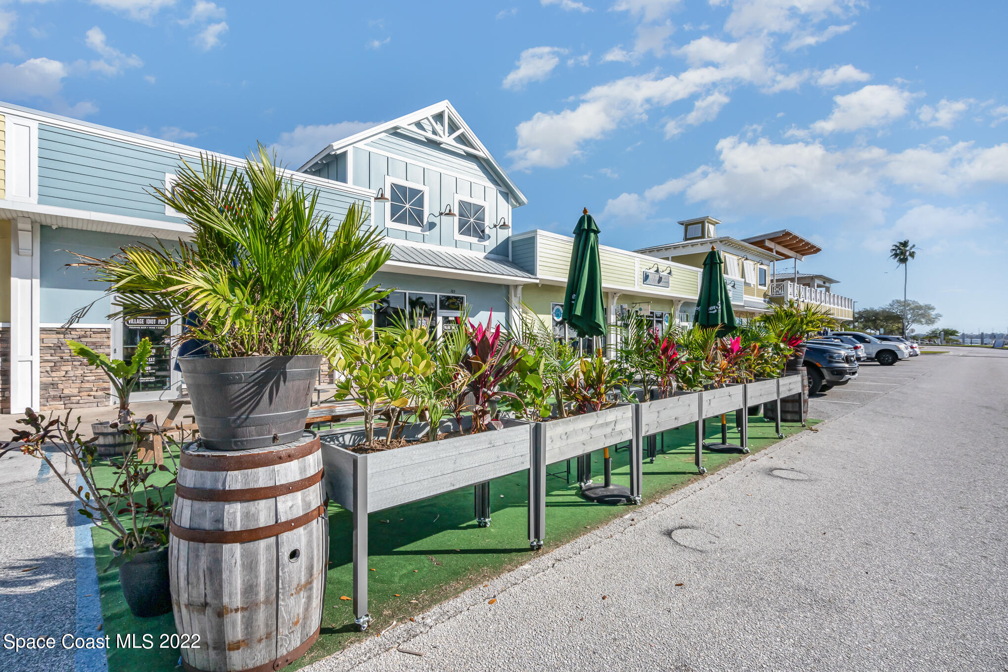 21 Riverside Drive, Unit 702 Cocoa, FL 32922 - Photo 47 of 53 a front view of house with a garden