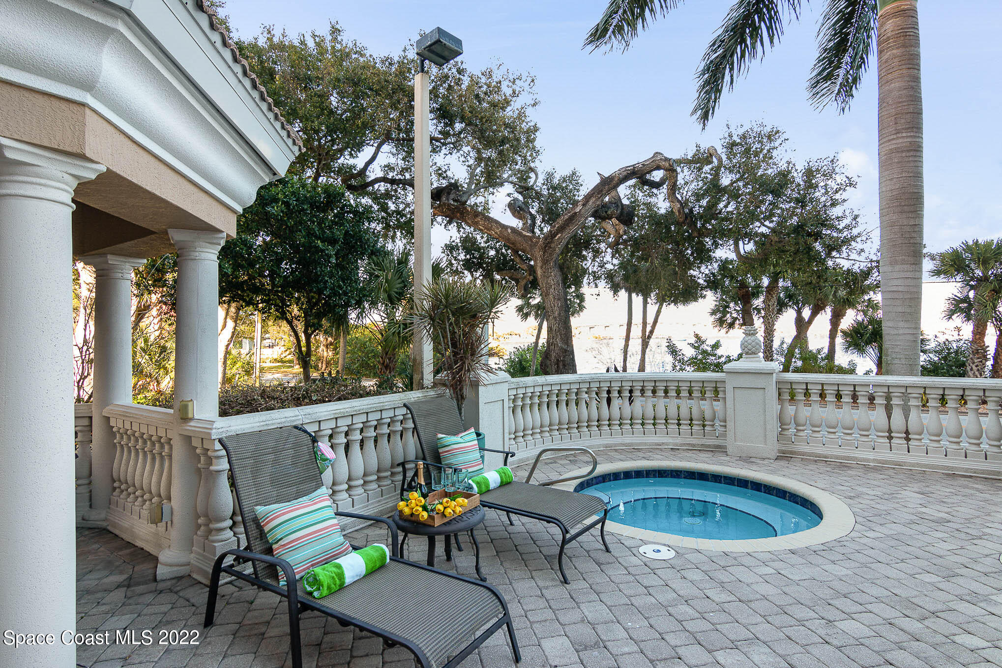 21 Riverside Drive, Unit 702 Cocoa, FL 32922 - Photo 6 of 53 a view of balcony with wooden floor and outdoor seating