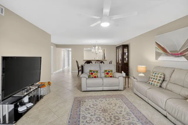 a spacious bathroom with a double vanity sink and a mirror