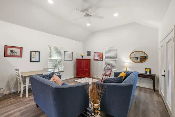 a view of a house with a yard and garage