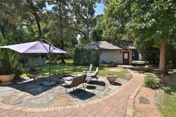 a backyard of a house with lots of green space