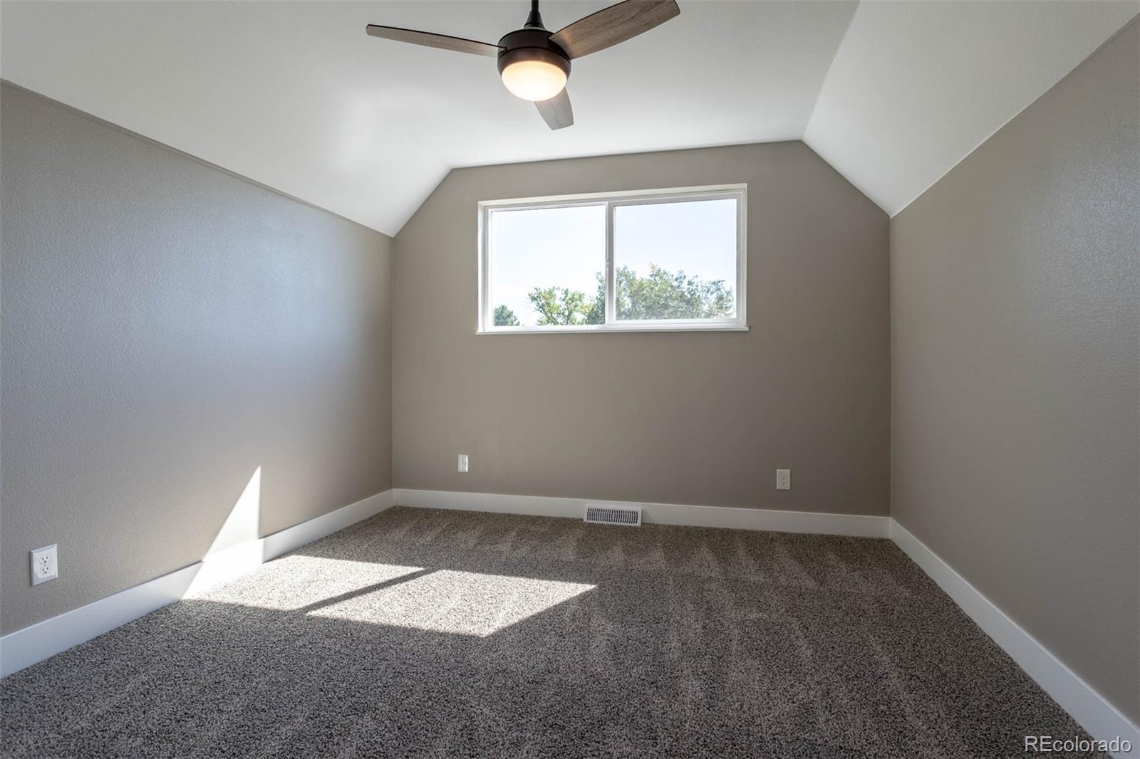 4465 South Eagle Circle Aurora, CO 80015 - Photo 16 of 26 an empty room with a window
