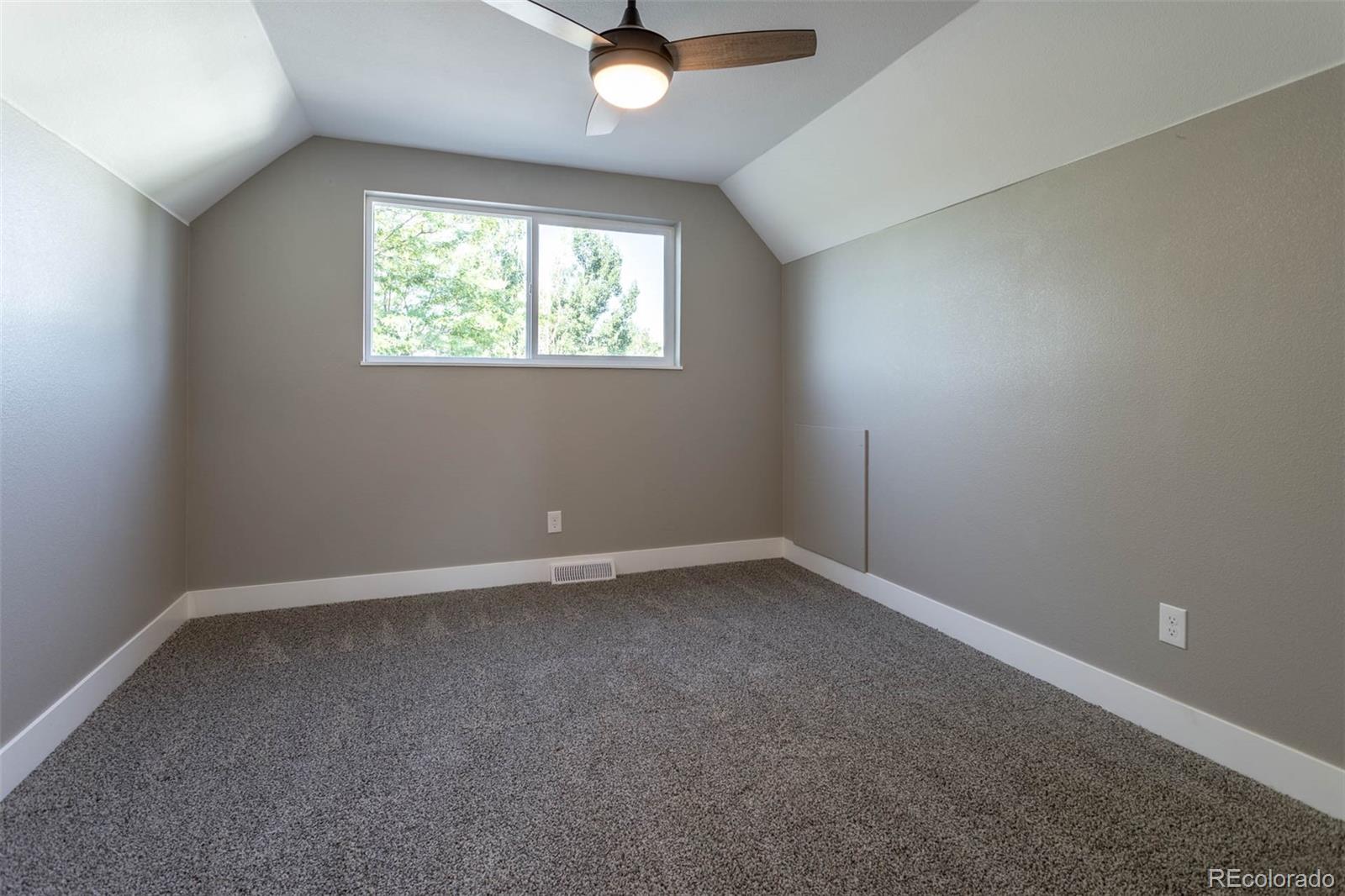 4465 South Eagle Circle Aurora, CO 80015 - Photo 19 of 26 an empty room with a window