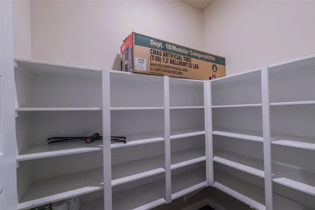 a view of an empty room with empty racks