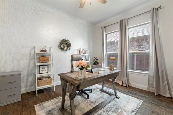 a workspace with furniture and window