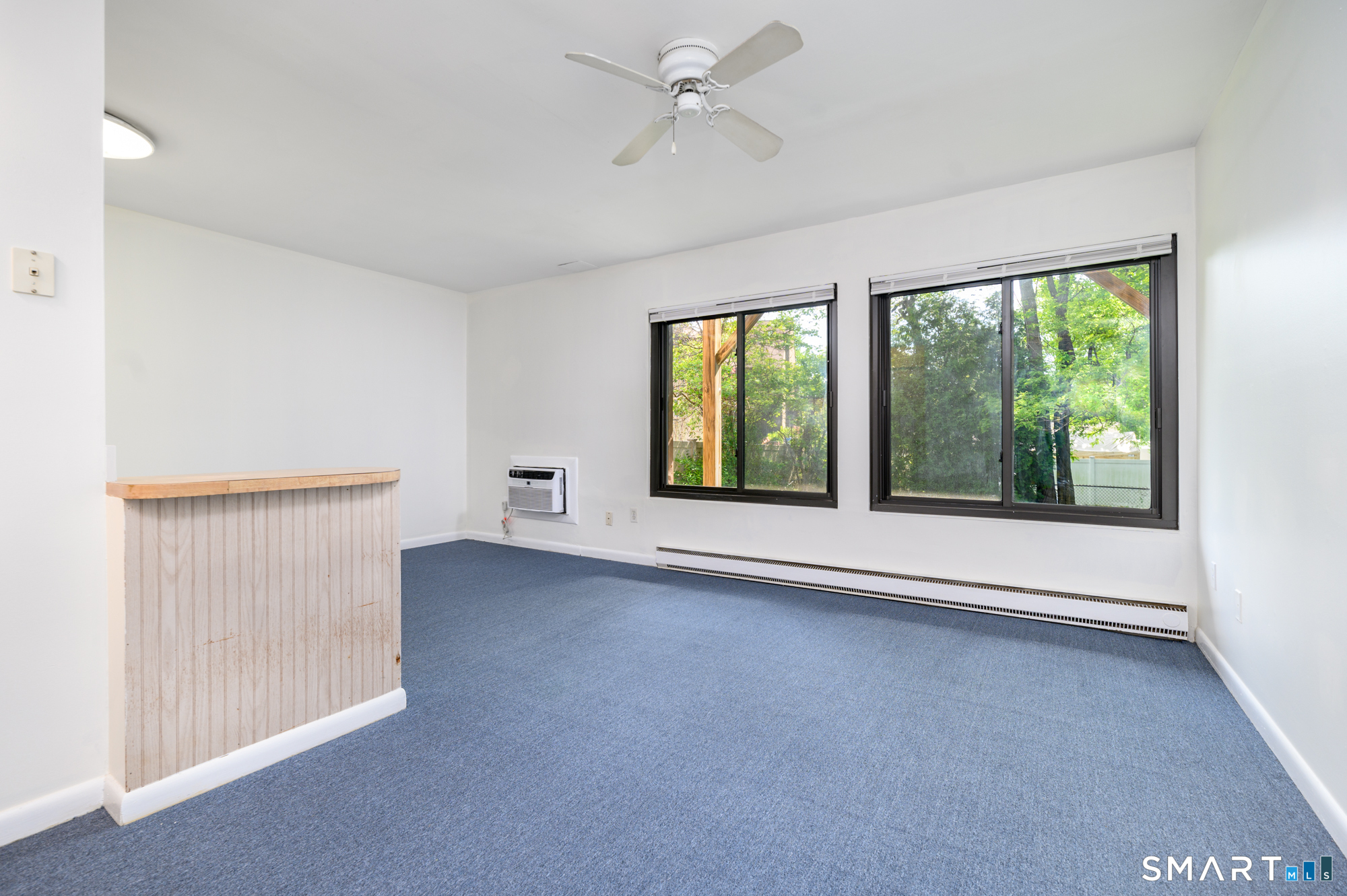 445 Hope Street, Unit 2 Stamford, CT 06906 - Photo 6 of 9 a view of an empty room with a window