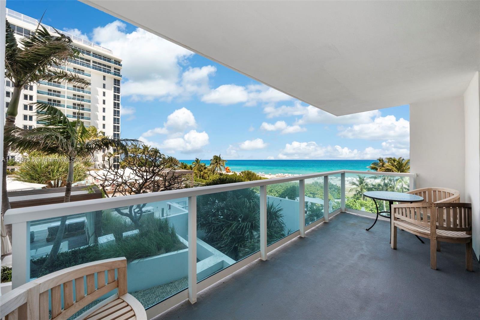 2301 Collins Avenue, Unit 410 Miami Beach, FL 33139 - Photo 12 of 42 a view of a balcony with chairs