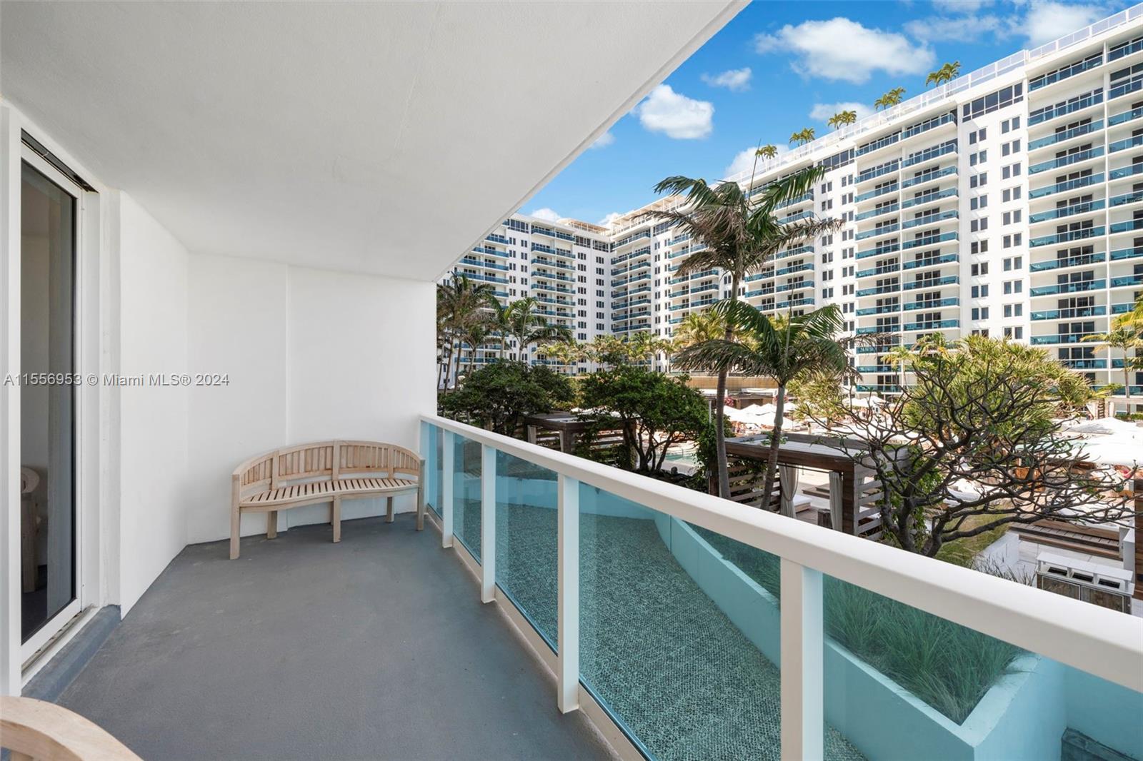 2301 Collins Avenue, Unit 410 Miami Beach, FL 33139 - Photo 13 of 42 a balcony with a bench