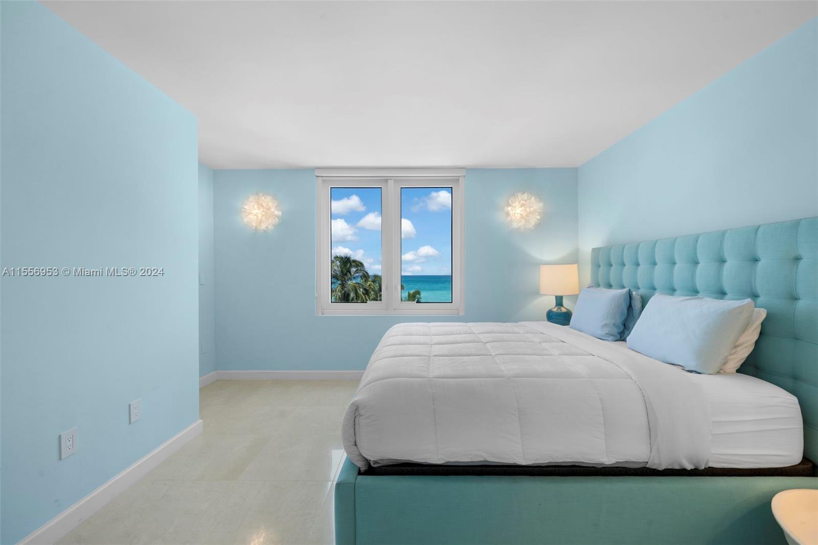 2301 Collins Avenue, Unit 410 Miami Beach, FL 33139 - Photo 21 of 42 a bedroom with a bed and a window