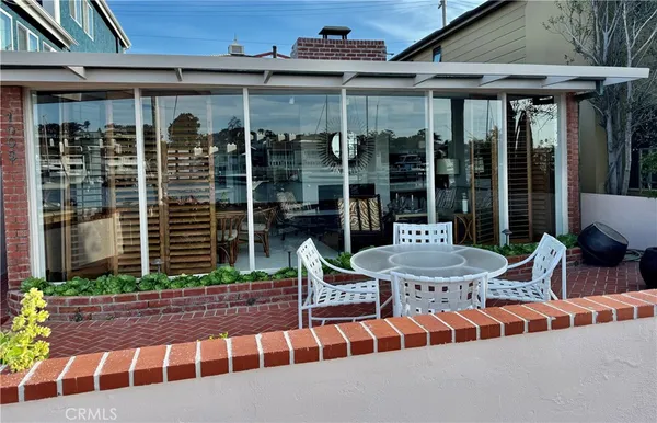 a front view of house with a patio