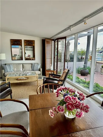 a view of living room with furniture and window