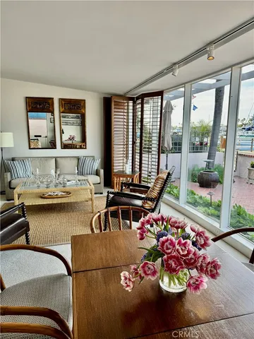 a view of living room with furniture and window
