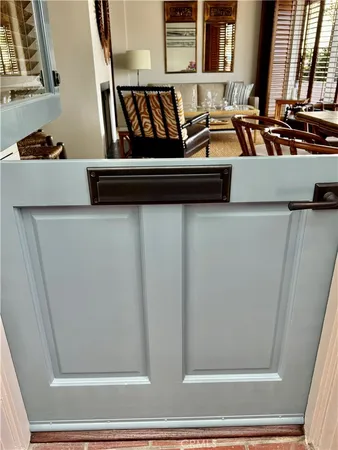 a kitchen with a stove a sink and a refrigerator