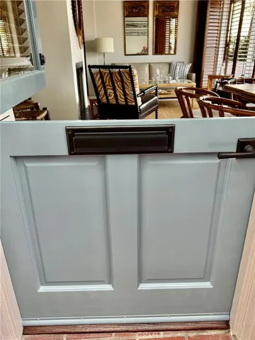 a kitchen with a stove a sink and a refrigerator