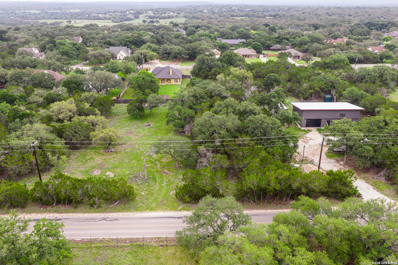 5742 Spring Branch Road Spring Branch, TX 78070 - Photo 20 of 39 a view of a lake with a city