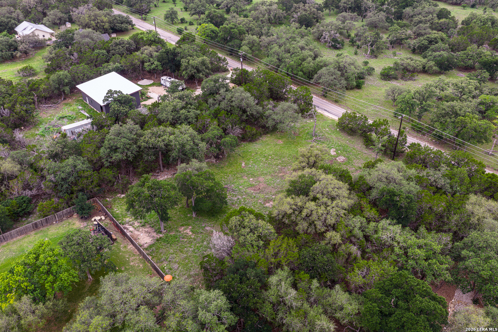 5742 Spring Branch Road Spring Branch, TX 78070 - Photo 22 of 39 an aerial view of a houses with yard