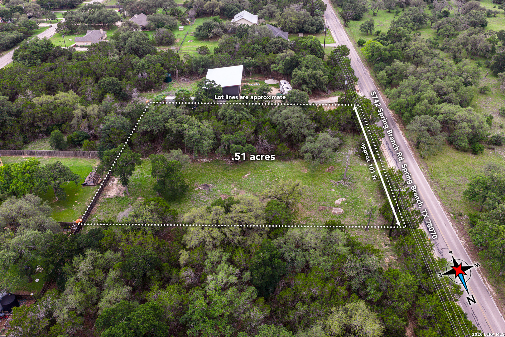 5742 Spring Branch Road Spring Branch, TX 78070 - Photo 23 of 39 an aerial view of residential houses with outdoor space and trees