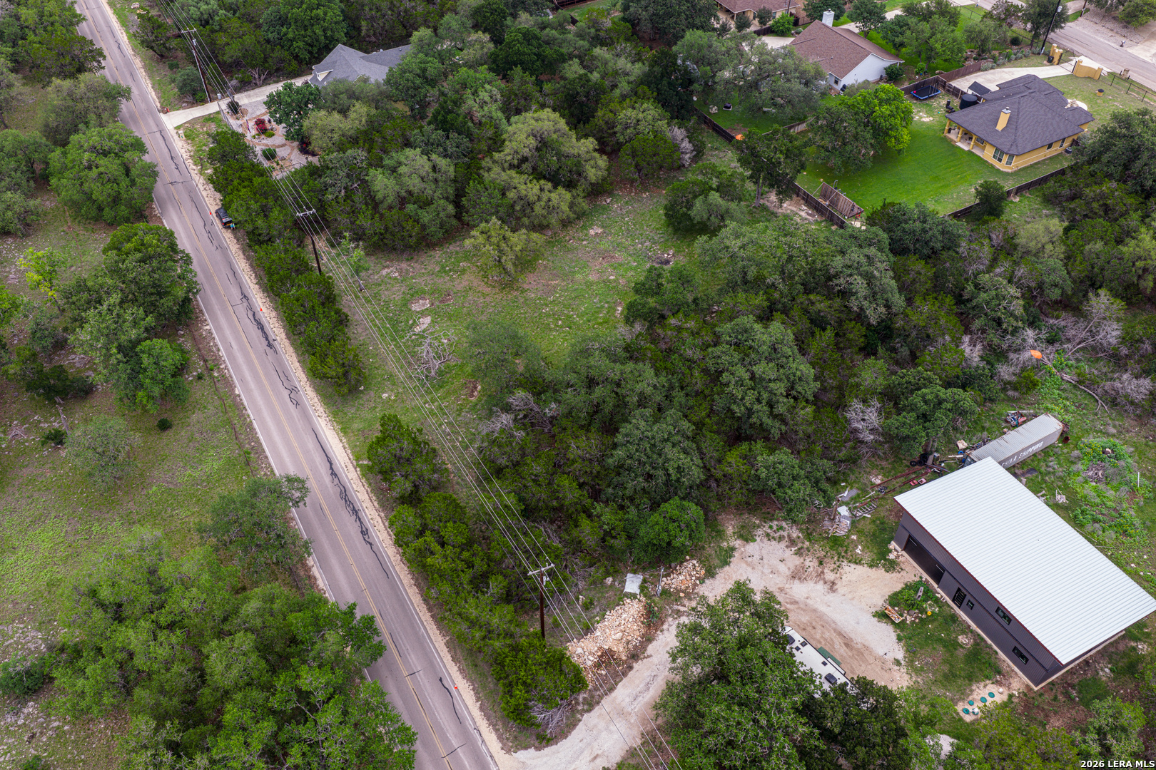5742 Spring Branch Road Spring Branch, TX 78070 - Photo 30 of 39 an aerial view of house with yard