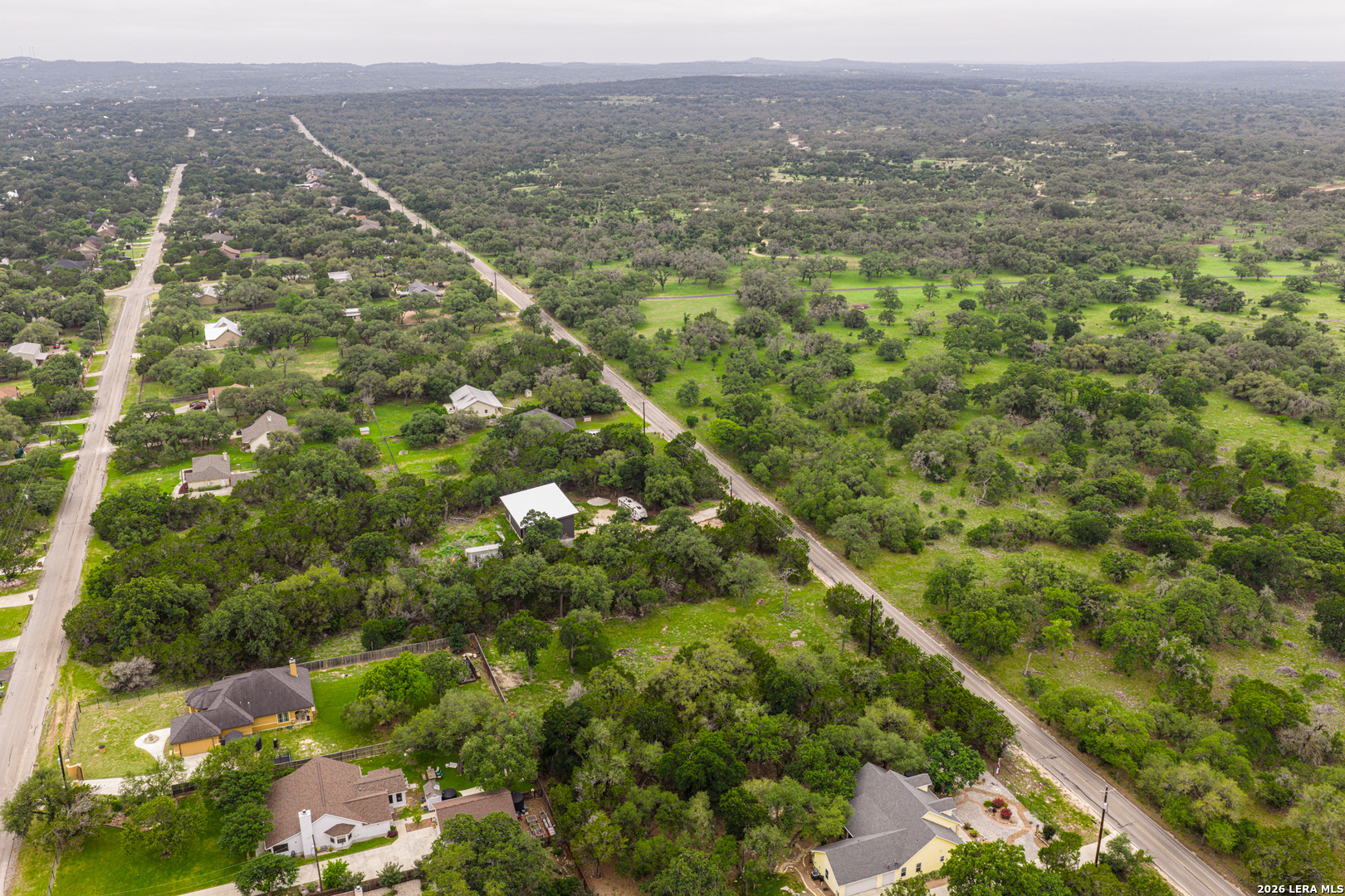 5742 Spring Branch Road Spring Branch, TX 78070 - Photo 33 of 39 a view of a city with lush green forest