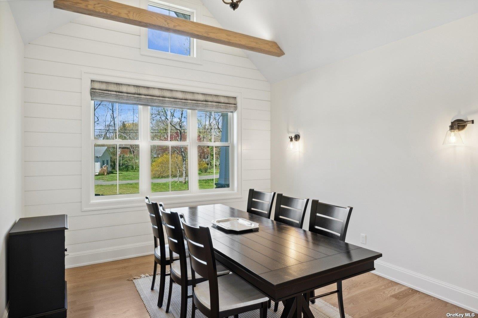 910 Glenn Road Southold, NY 11971 - Photo 11 of 33 a view of a dining room with furniture and window