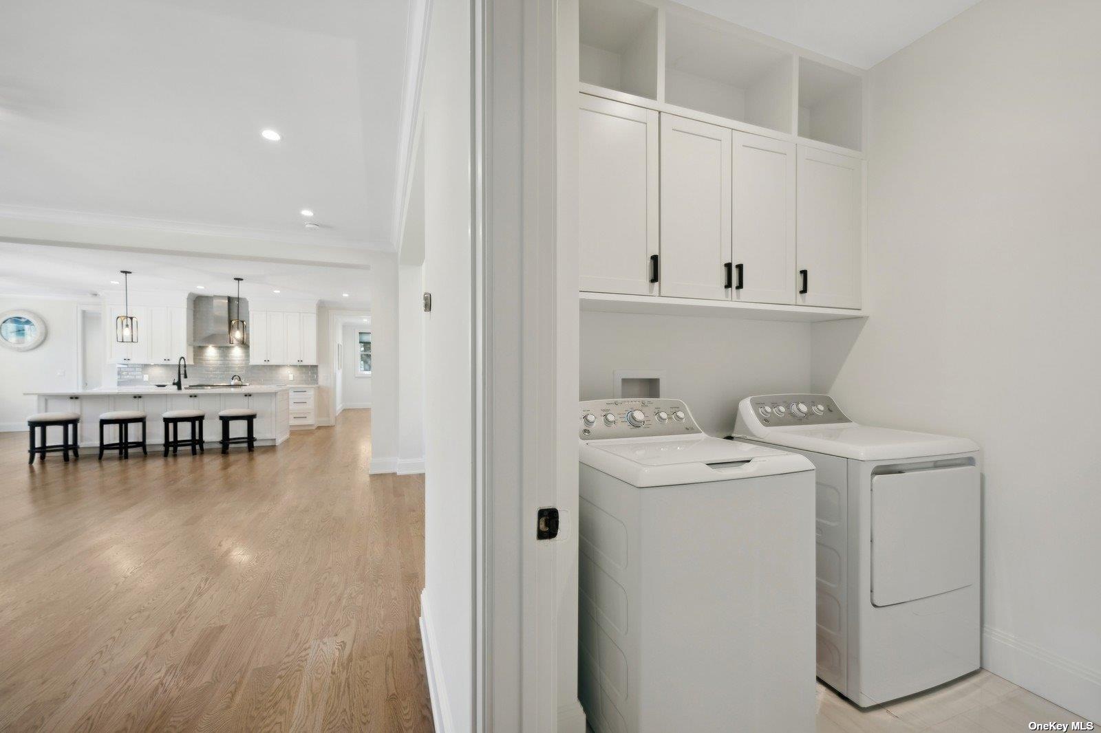 910 Glenn Road Southold, NY 11971 - Photo 12 of 33 a view of living room with furniture and wooden floor
