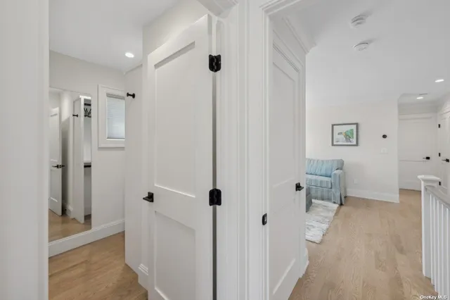a view of a hallway with closet