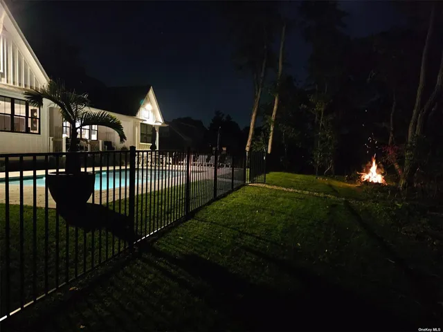 a view of a porch and garden
