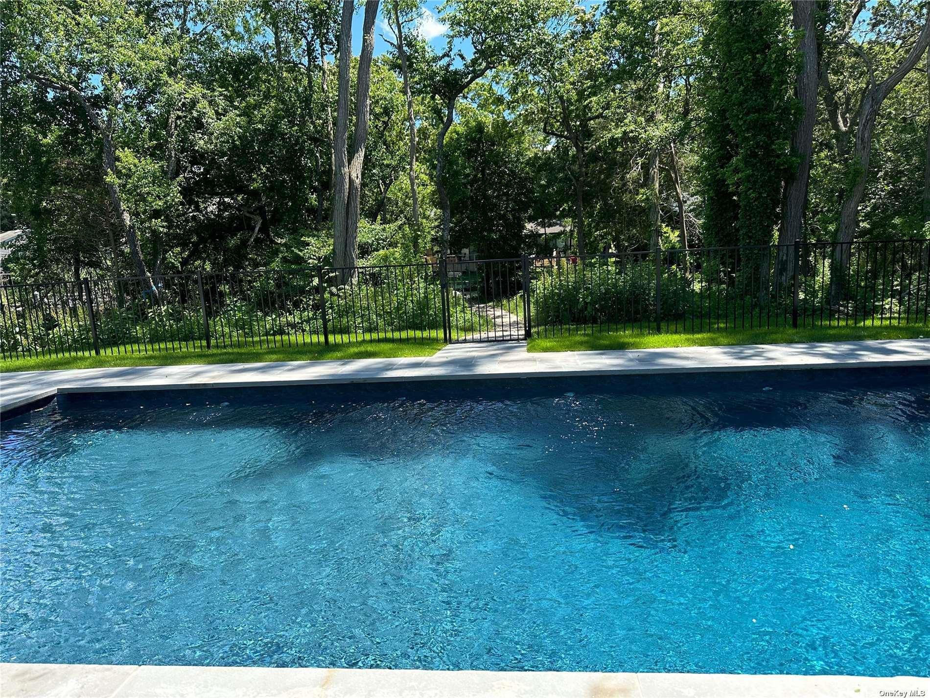 910 Glenn Road Southold, NY 11971 - Photo 29 of 33 a view of swimming pool with a yard