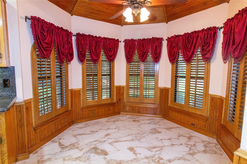 3014 Pecan Ridge Drive Rowlett, TX 75088 - Photo 8 of 29 a view of a bedroom with a bed and wooden floor